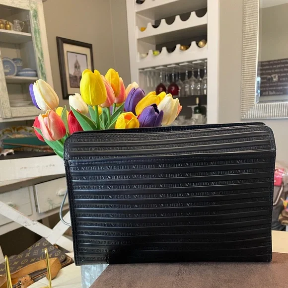 Mario Valentino Black and Gold Clutch with Elegant Wristlet